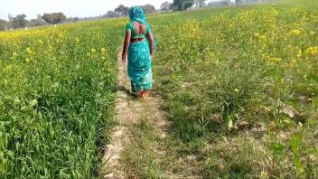 Rubbing the country bhaji in the wheat field